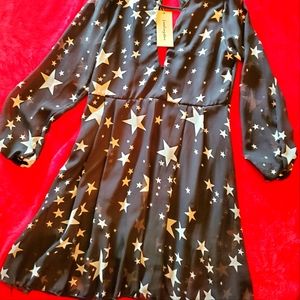 Chiffon black and white star deep v in back dress.